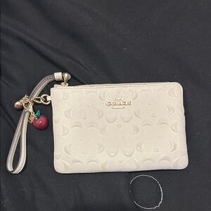 Coach Embossed Cream Wristlet